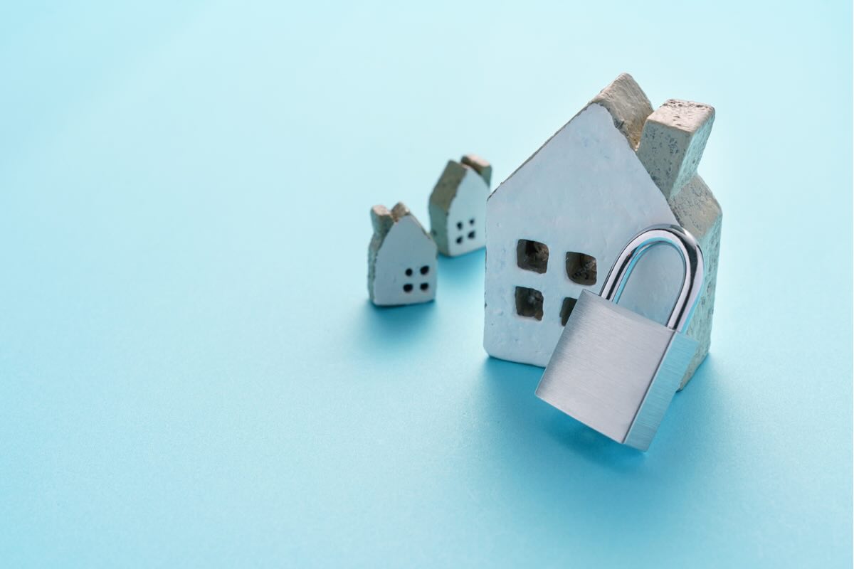 casa, casette e lucchetto